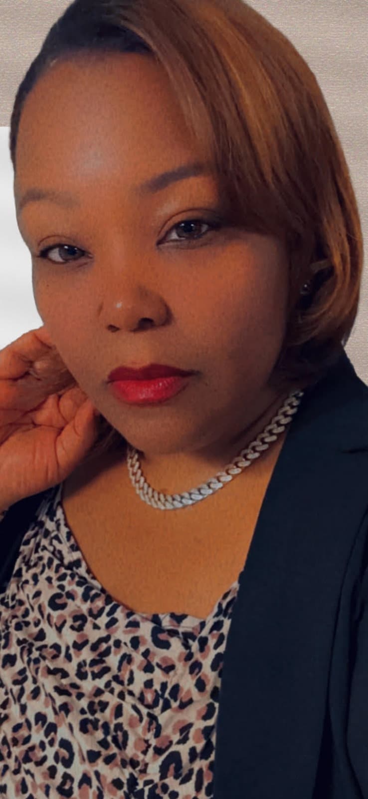 Raquel Purvis - Owner, Goodwill Transportation Services Photo of Raquel Purvis, owner of Goodwill Transportation Services, smiling inside a transportation van